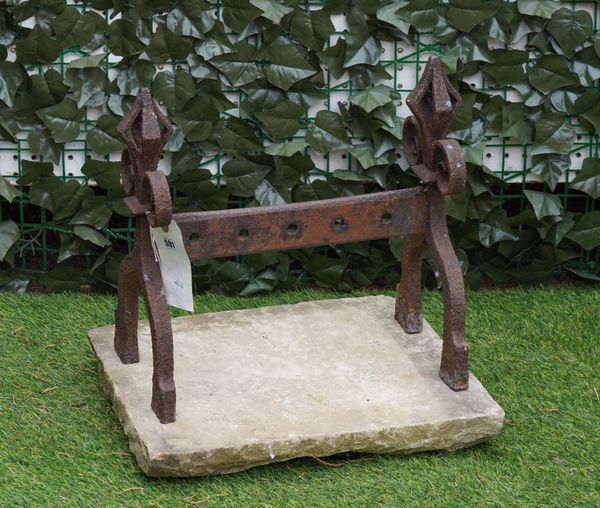 A 19TH CENTURY WROUGHT IRON BOOTSCRAPER