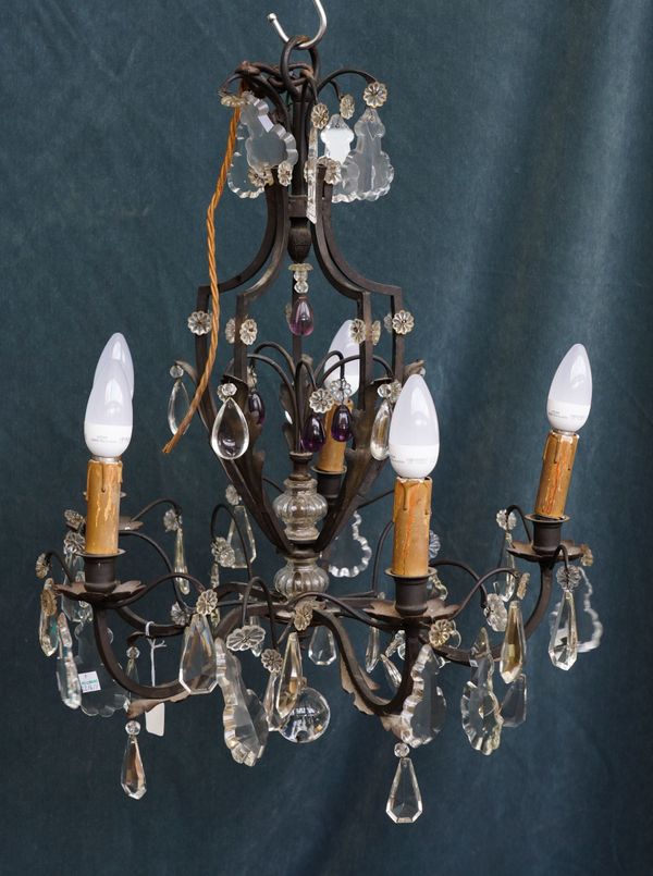 A FRENCH LOUIS XV STYLE WROUGHT IRON AND GLASS FIVE LIGHT CHANDELIER