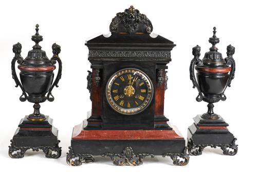RETAILED BY TIFFANY & CO. NEW YORK: A BRONZE MOUNTED BLACK AND ROUGE MARBLE CLOCK GARNITURE