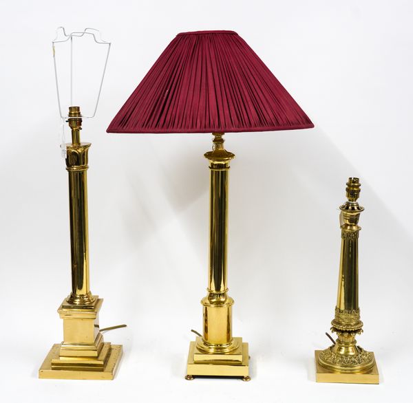 THREE POLISHED GILT-METAL COLUMN TABLE LAMPS (3)