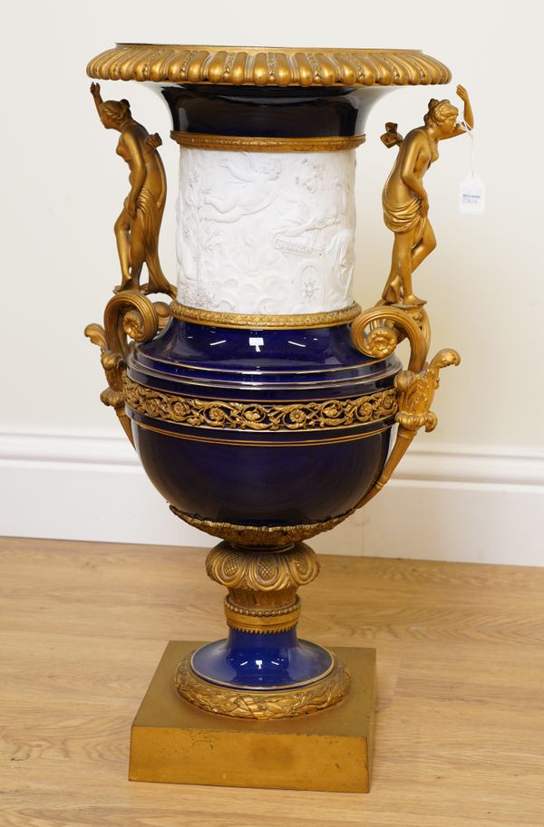 A FRENCH ORMOLU MOUNTED PARIS AND BISCUIT PORCELAIN ORNAMENTAL VASE