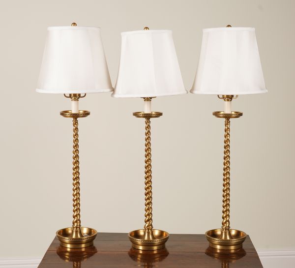 RALPH LAUREN: A SET OF THREE POLISHED BRASS ROPETWIST TABLE LAMPS (3)