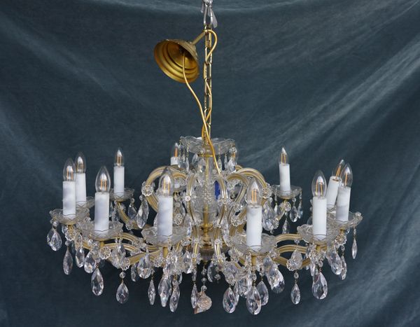 PROBABLY SWAROVSKI: A PAIR OF CUT GLASS TWELVE BRANCH CHANDELIERS (2)