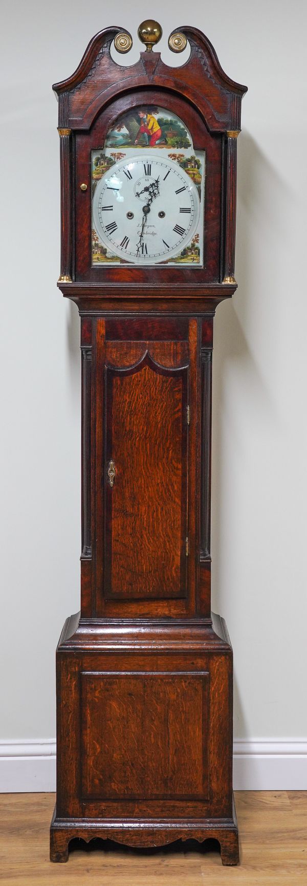 J. MORGAN, CAMBRIDGE: AN EARLY 19TH OAK AND MAHOGANY CROSSBANDED LONCASE CLOCK