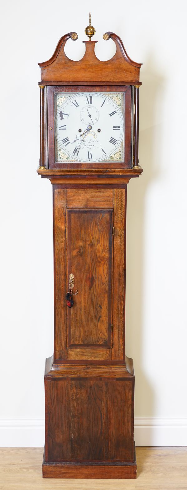 EVAN EVANS, TOTNES: AN EARLY 19TH CENTURY OAK AND MAHOGANY CROSSBANDED LONGCASE CLOCK