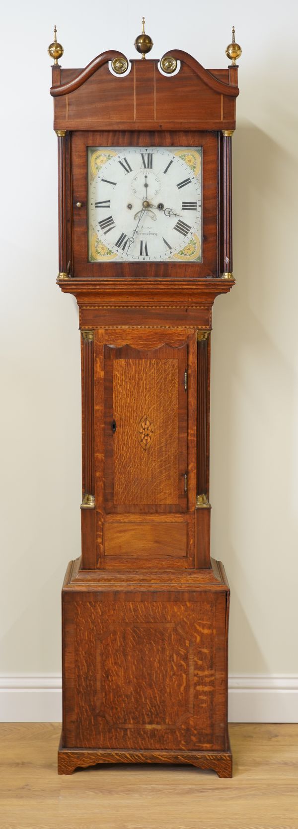 WILLIAM EVANS, SHREWSBURY: A LATE GEORGE III OAK, MAHOGANY AND CHEQUER INLAID LONGCASE CLOCK