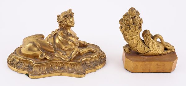 A FRENCH GILT-METAL SPHINX AND CORNUCOPIA (2)