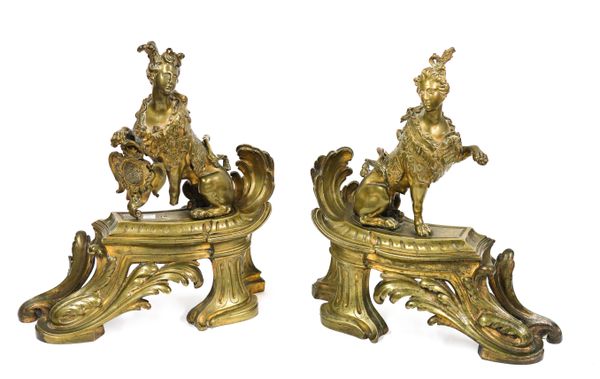 A PAIR OF FRENCH ORMOLU SPHINX-MOUNTED CHENETS (2)