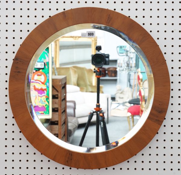 A MODERN CIRCULAR YEW WOOD BEVELLED GLASS WALL MIRROR