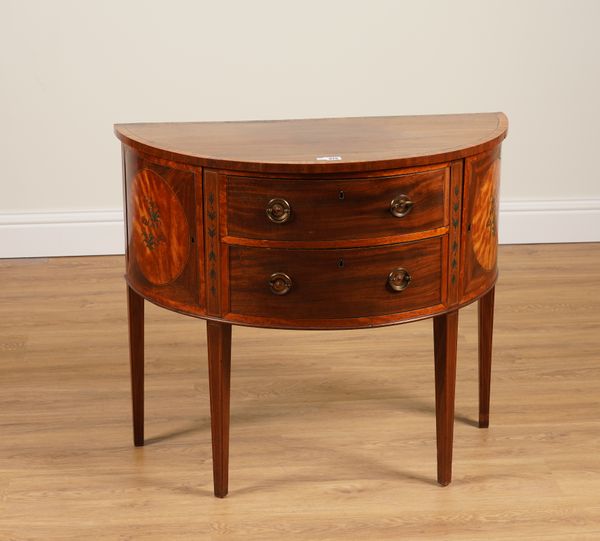 A GEORGE III POLYCHROME PAINTED SATINWOOD BOWFRONT COMMODE OF SHERATON STYLE