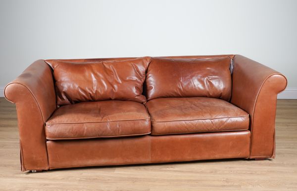 HEALS; A TAN LEATHER UPHOLSTERED THREE SEATER SOFA