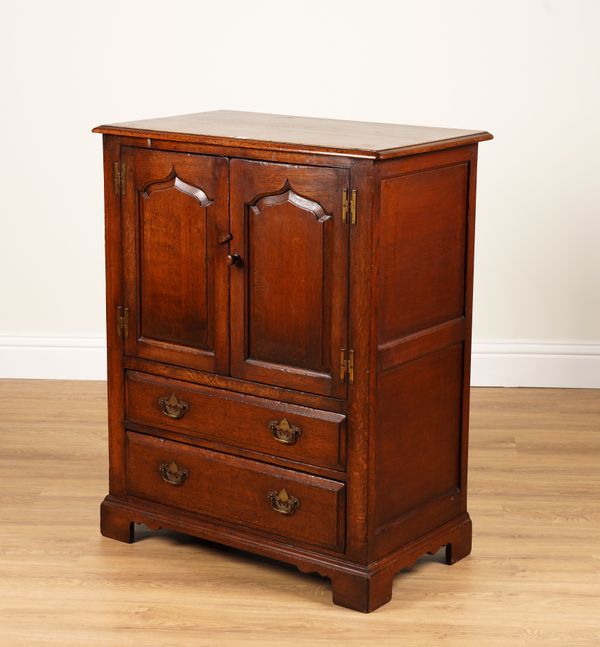 A 17TH CENTURY STYLE OAK SIDE CABINET