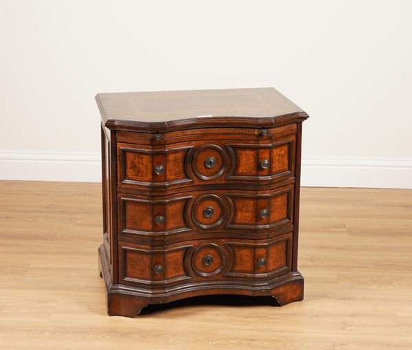 MICHAEL AMINI; A WALNUT THREE DRAWER COMMODE OF 18TH CENTURY GERMAN STYLE