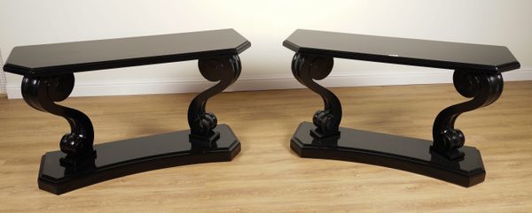 RALPH LAUREN; A PAIR OF MAYFAIR SCROLL BLACK LACQUER CANTED RECTANGULAR CONSOLES ON DUAL SCROLL SUPPORTS (2)