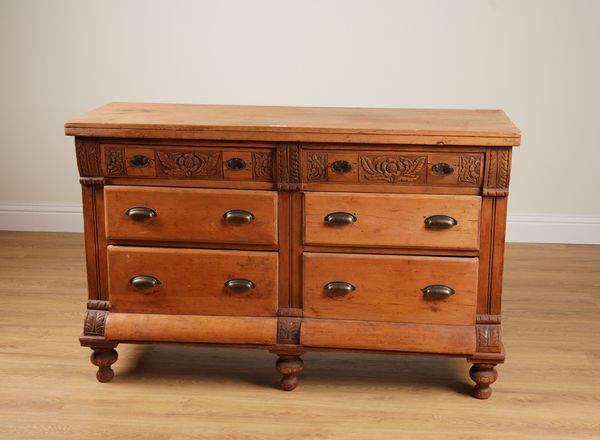 A 19TH CENTURY FRENCH PINE SIX DRAWER SIDE CABINET