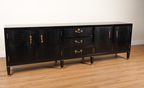 RALPH LAUREN; A BROOK STREET BLACK LACQUER PARCEL GILT SIDE CABINET WITH FAUX CROCODILE LEATHER VENEERED DRAWERS AND CUPBOARDS
