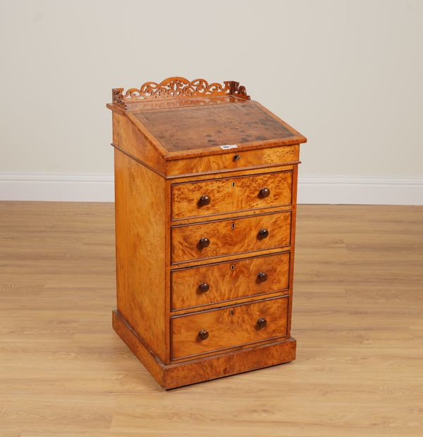 C HINDLEY AND SONS LATE MILES AND EDWARDS; AN EARLY 19TH CENTURY BURR YEW SWIVEL TOP DAVENPORT