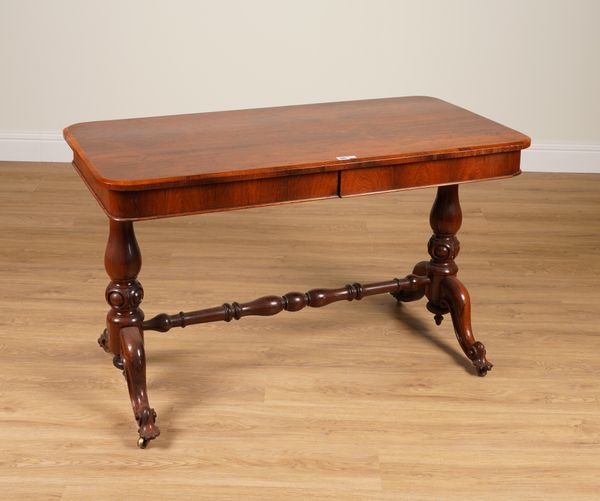 A VICTORIAN ROSEWOOD ROUNDED RECTANGULAR TWO DRAWER CENTRE TABLE