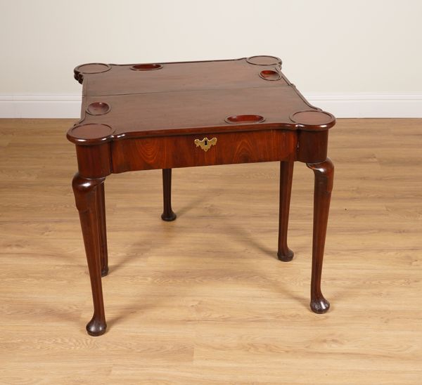 A MID 18TH CENTURY WALNUT TRIPLE ACTION FOLD OVER GAMES AND TEA TABLE