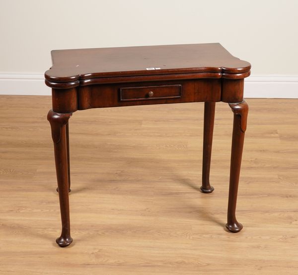 A GEORGE II MAHOGANY FOLD OVER GAMES TABLE