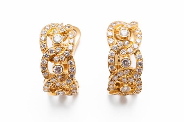 A PAIR OF GARRARD EARRINGS