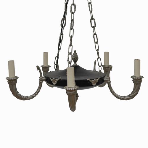 BESSELINK & JONES, LONDON: AN EMPIRE STYLE NICKEL AND BLACK PATINATED METAL FIVE LIGHT CHANDELIER