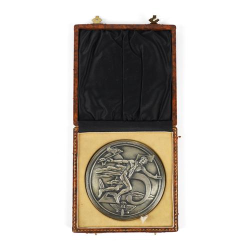 AN AUSTIN MOTORS 25 YEAR SILVER PLATED CIRCULAR PLAQUE