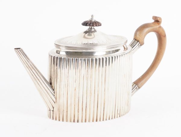 A GEORGE III SILVER TEAPOT