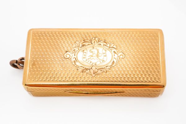 A GOLD RECTANGULAR VINAIGRETTE