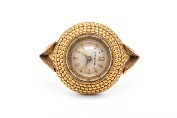 AN OMEGA GOLD RING WATCH