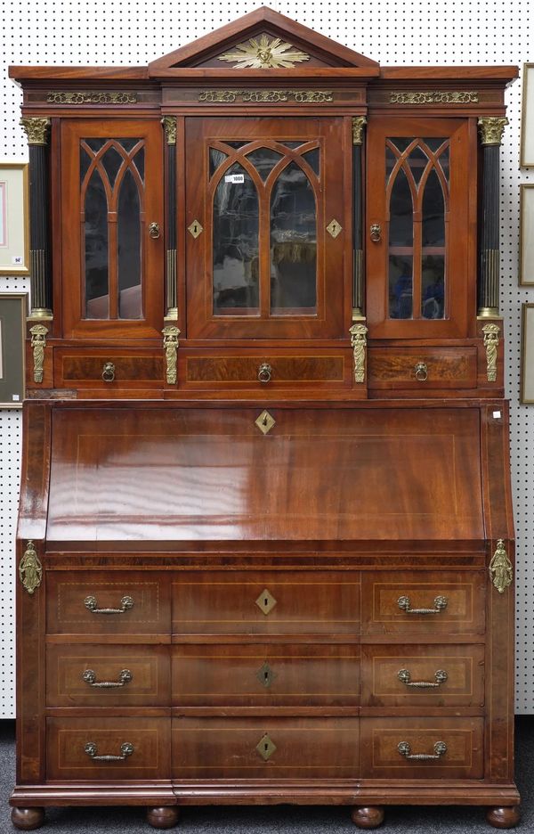 A 19TH CENTURY CONTINENTAL GILT METAL MOUNTED MAHOGANY BUREAU CABINET