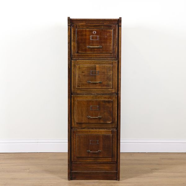AN EDWARDIAN STAINED BEECH FOUR DRAWER FILING CHEST