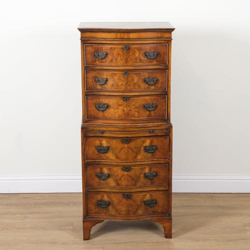 AN 18TH CENTURY STYLE WALNUT SERPENTINE CHEST ON CHEST