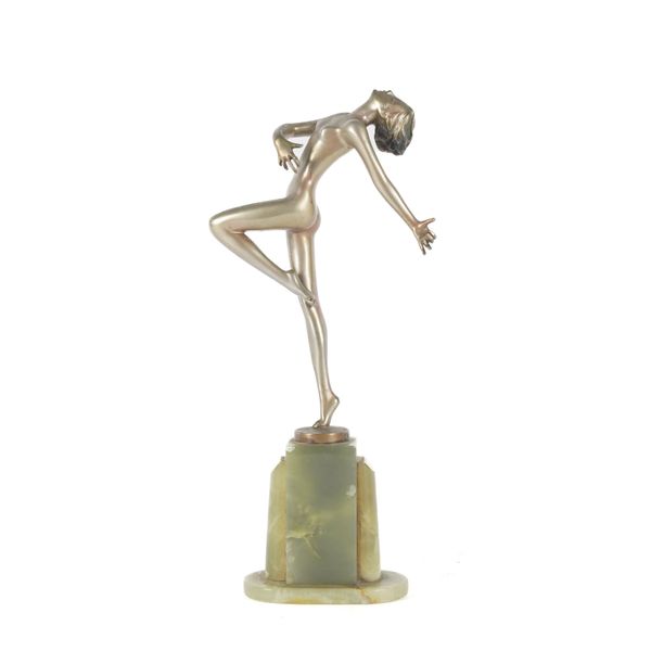 AFTER LORENZL: A SILVERED BRONZE MODEL OF A DANCER ON A GREEN ONYX BASE