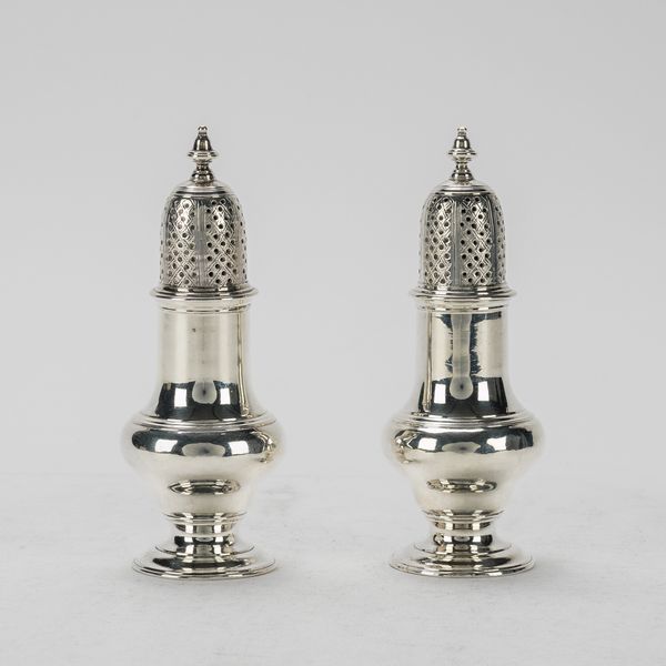 A PAIR OF GEORGE III SILVER CASTERS (2)