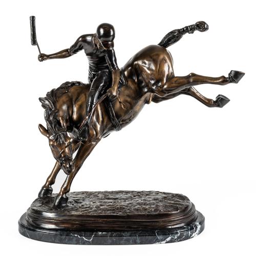 A BRONZE EFFECT CAST METAL FIGURE OF A POLO PLAYER