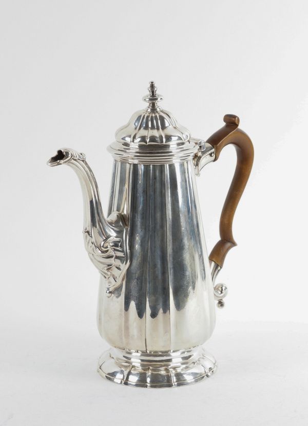 A LATE GEORGE II SILVER COFFEE POT