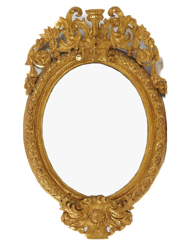 A LOUIS XV STYLE GILT FRAMED OVAL MIRROR