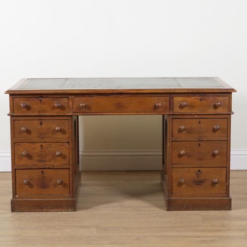 A VICTORIAN OAK PEDESTAL DESK