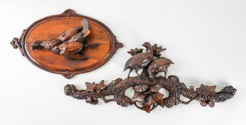 A WALNUT RELIEF CARVED TROPHY OF GAME AND FOUR OTHER PANELS (6)