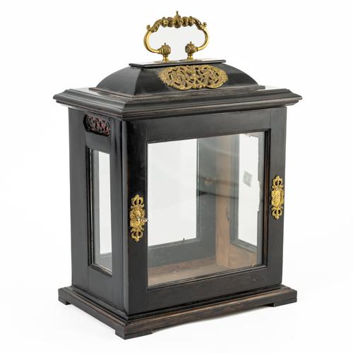 A GILTMETAL-MOUNTED EBONISED CLOCK CASE