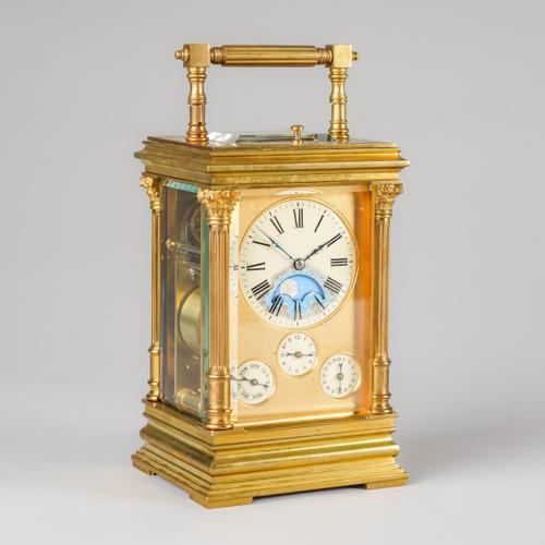 A RARE FRENCH GILT BRASS MOONPHASE, CALENDAR, GRANDE SONNERIE STRIKING AND REPEATING CARRIAGE CLOCK