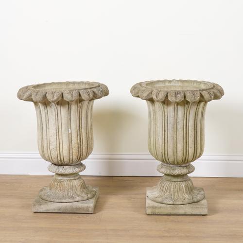 A PAIR OF RECONSTITUTED STONE GARDEN URNS (4)
