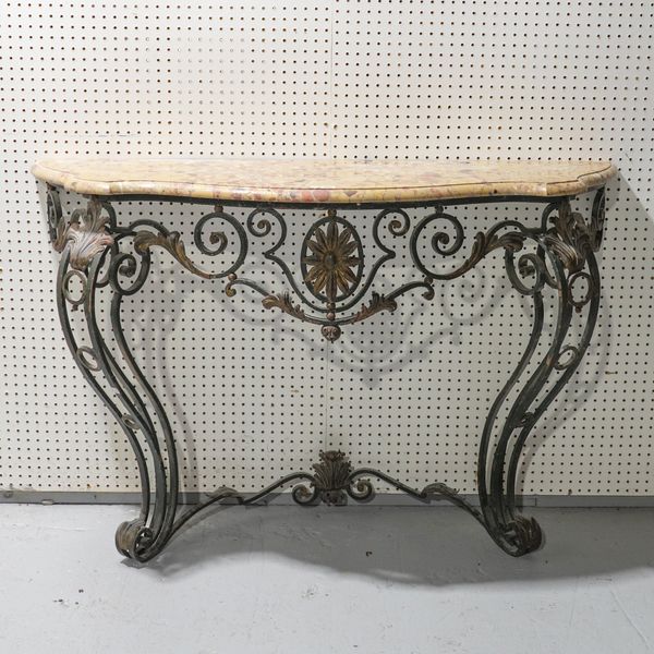 A LATE 19TH CENTURY WROUGHT IRON SERPENTINE MARBLE TOPPED CONSOLE TABLE