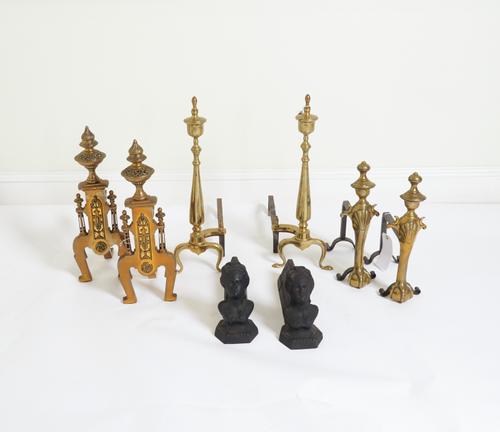 THREE PAIRS OF BRASS ANDIRONS AND ANOTHER CAST-IRON PAIR (8)