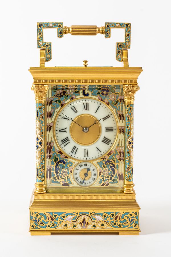 A FRENCH GILT BRASS CHAMPLEVÉ ENAMEL STRIKING AND REPEATING CARRIAGE CLOCK