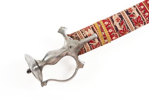 AN INDO-PERSIAN TALWAR WITH PIERCED DISC POMMEL