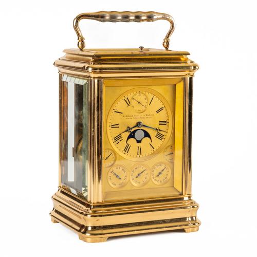 A FINE AND RARE GILT-BRASS GORGE CASE GIANT GRANDE SONNERIE CARRIAGE CLOCK WITH MOONPHASE, CALENDAR, TEMPERATURE AND STATE OF WIND