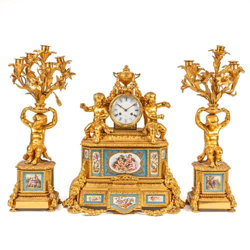 A FRENCH ORMOLU AND SEVRES-STYLE BLUE GROUND PORCELAIN PANEL GARNITURE