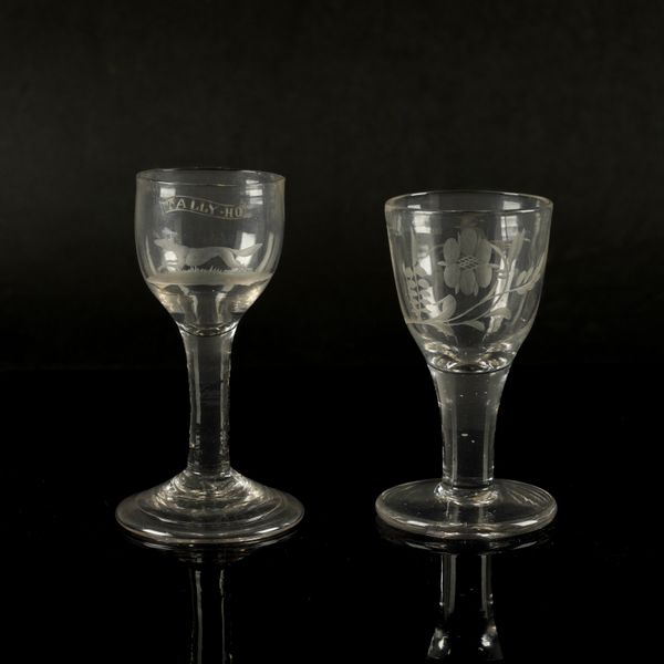 TWO SMALL ENGRAVED PLAIN-STEMMED WINE GLASSES (2)